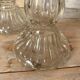 Paire de bougeoirs en verre flacons roger gallet