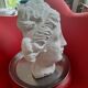 White plaster statue: man's head.