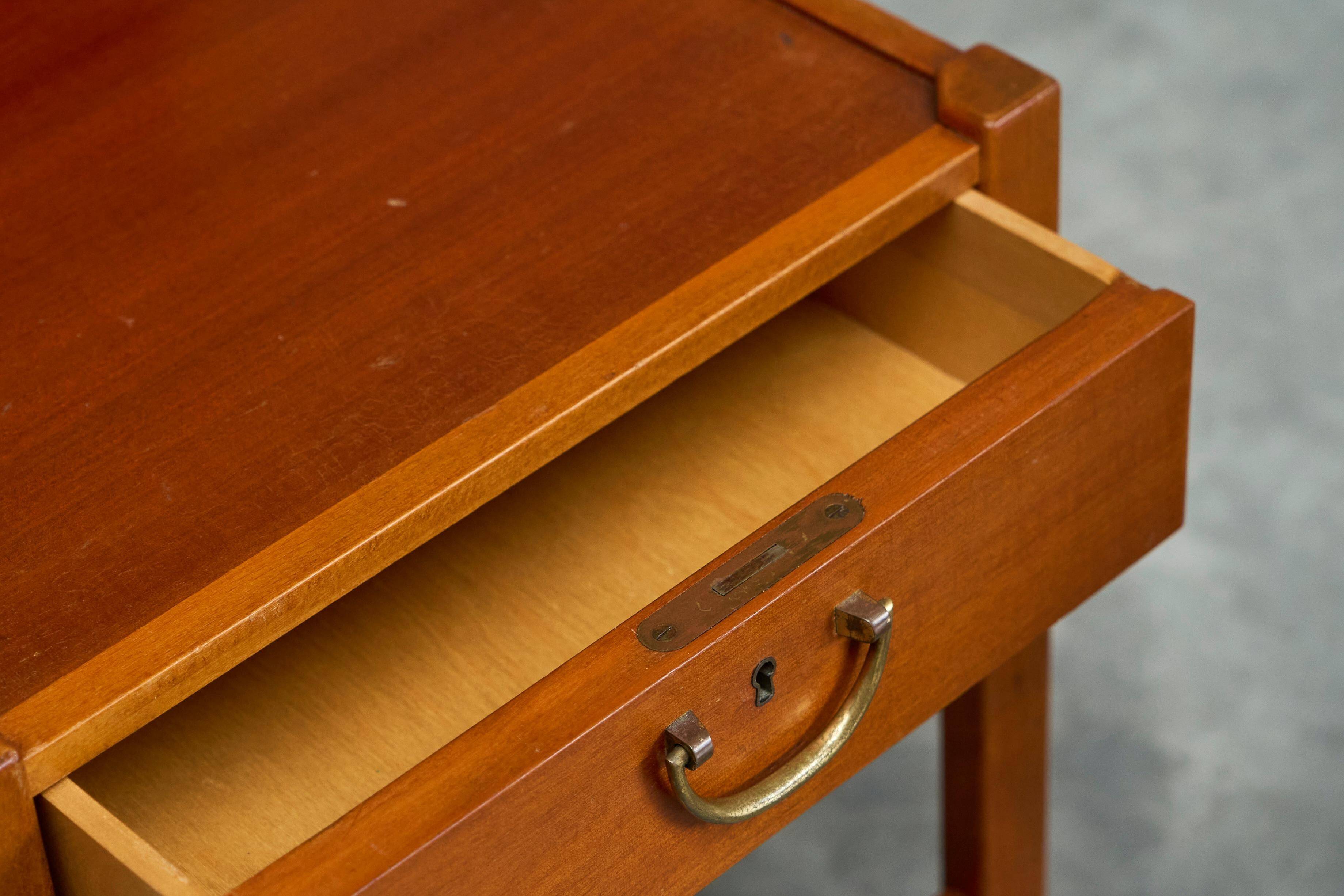Pair of bedside tables by Nordiska Kompaniet in teak, 1952, by David Rosén.