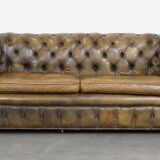 2.5 seater leather chesterfield sofa in a moss green color