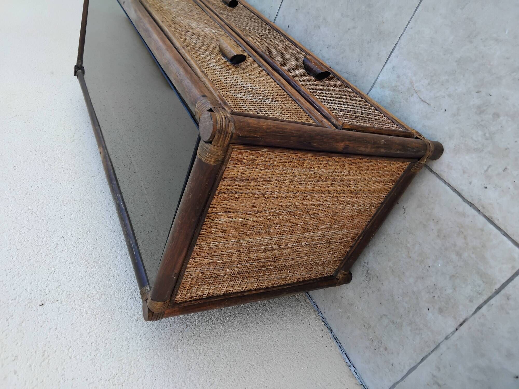 Vintage rattan and glass TV unit.