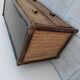 Vintage rattan and glass TV unit.