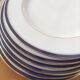 Six blue and gold Limoges porcelain dinner plates