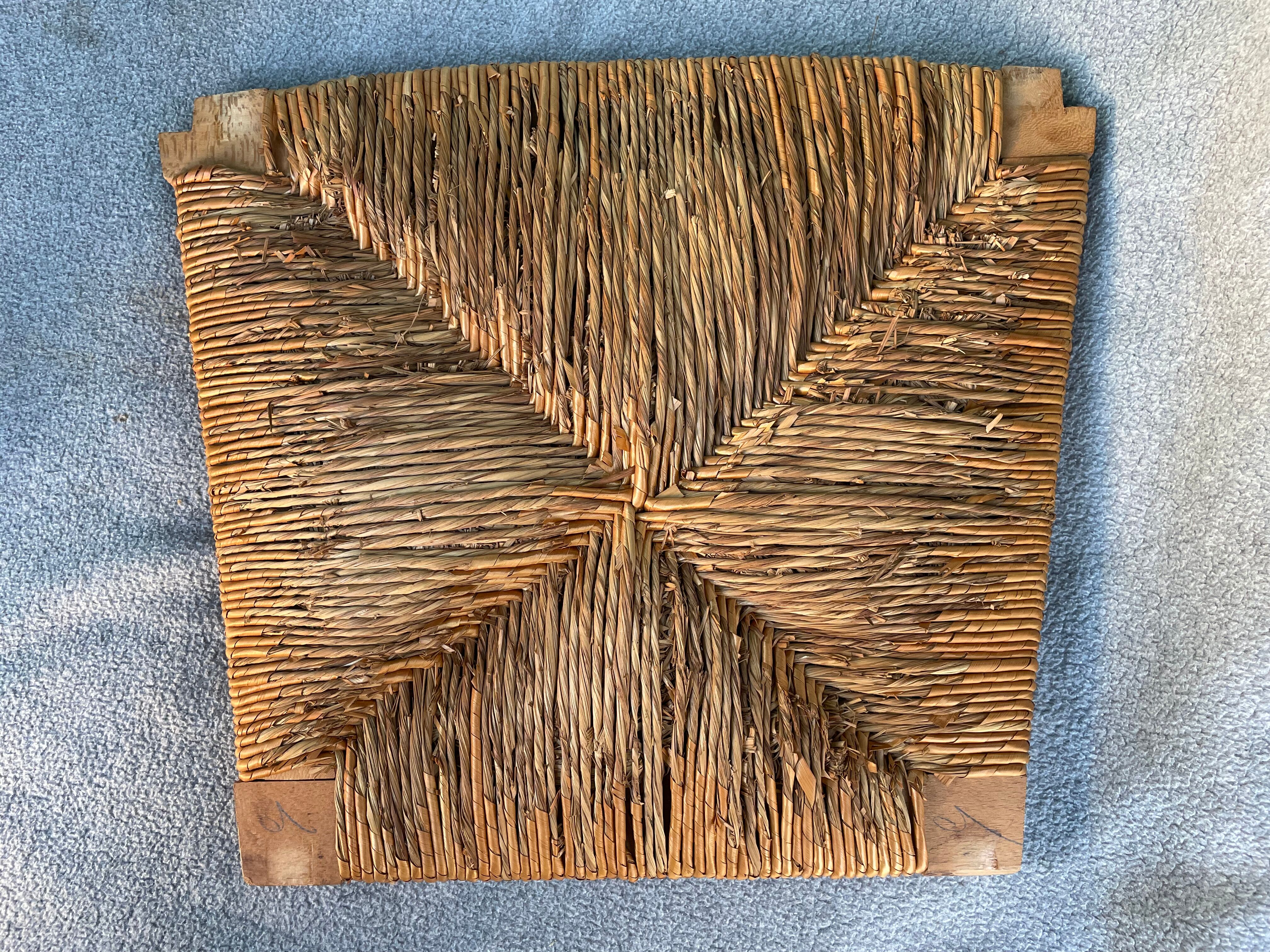 Vintage armchair in straw and brutalist wood