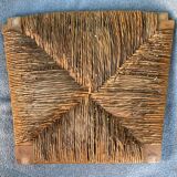 Vintage armchair in straw and brutalist wood