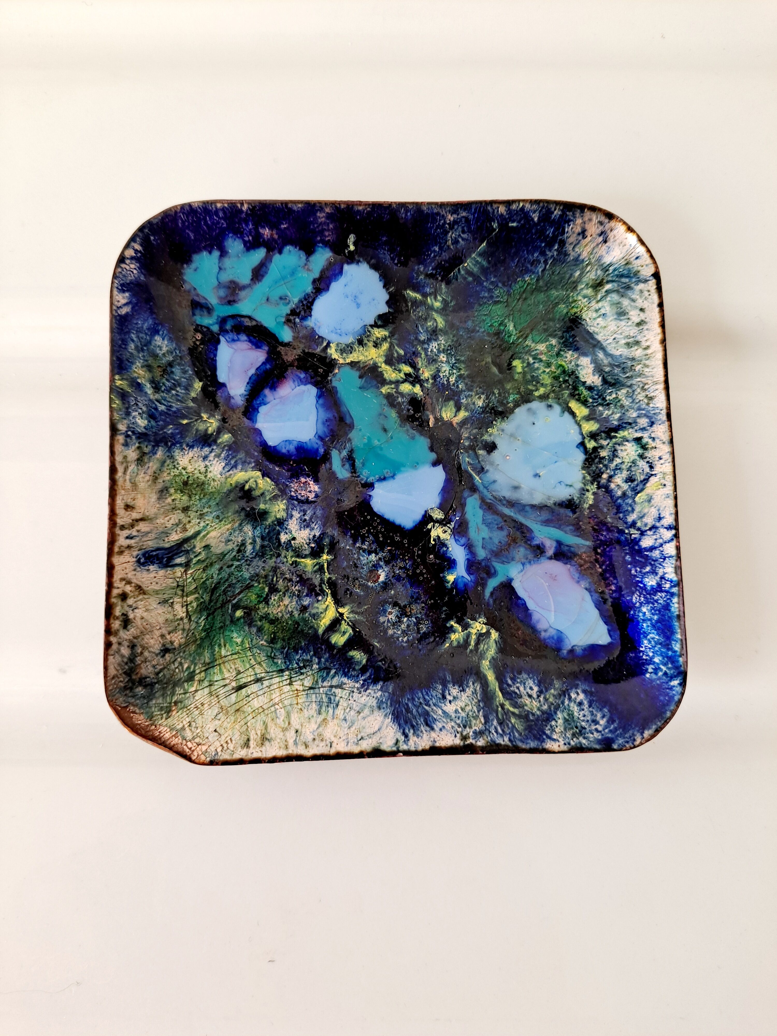 Empty blue enamel pocket