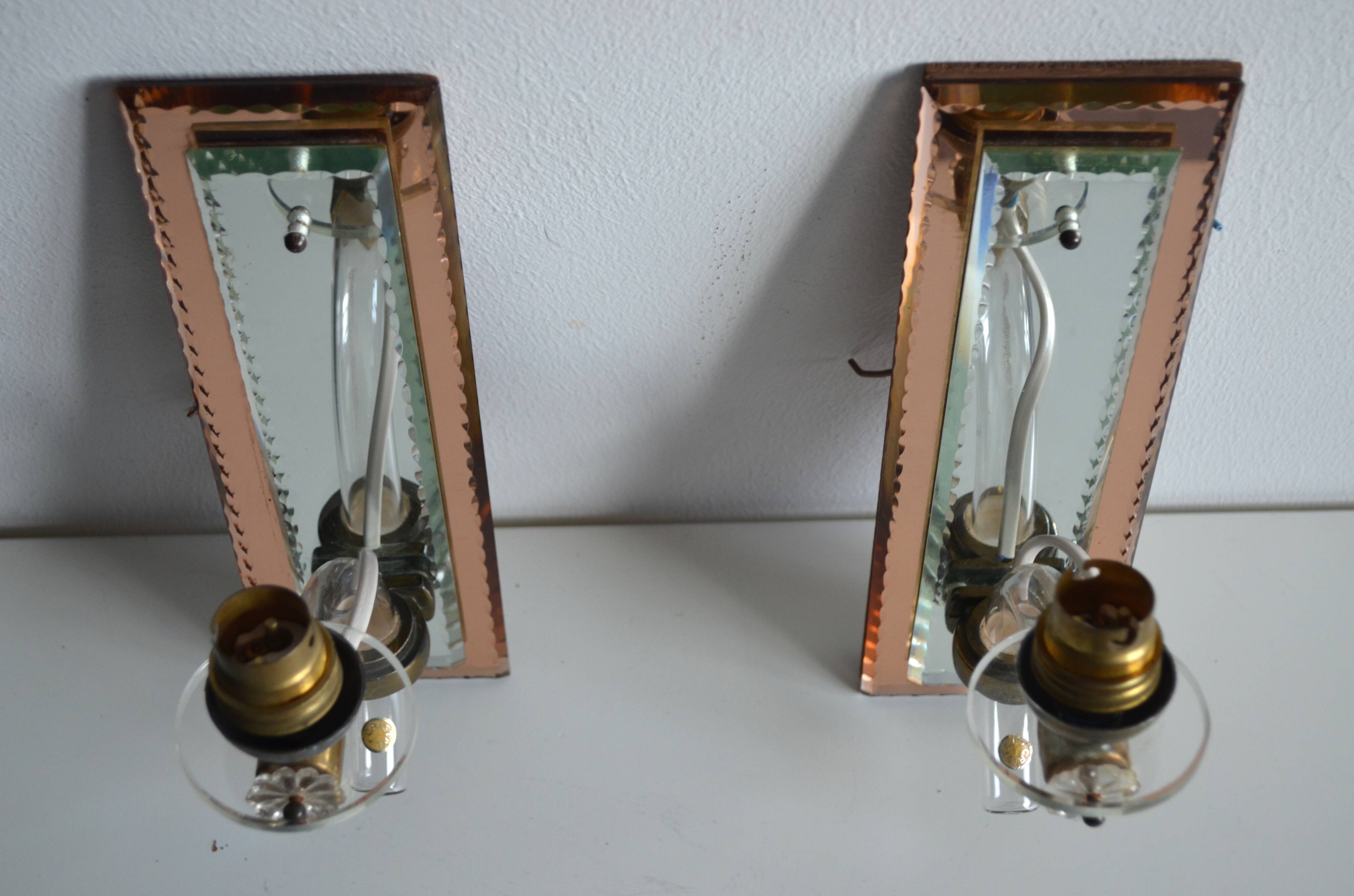 Pair of mirror and crystal wall lights from the 1940s-50s.
