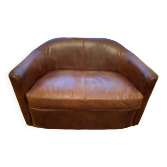 Canapé corbeille vintage en cuir.
