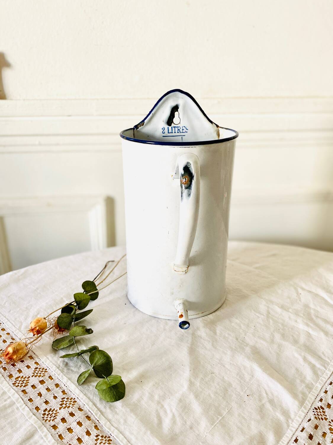 Old medical fountain in white enameled sheet metal