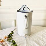 Old medical fountain in white enameled sheet metal