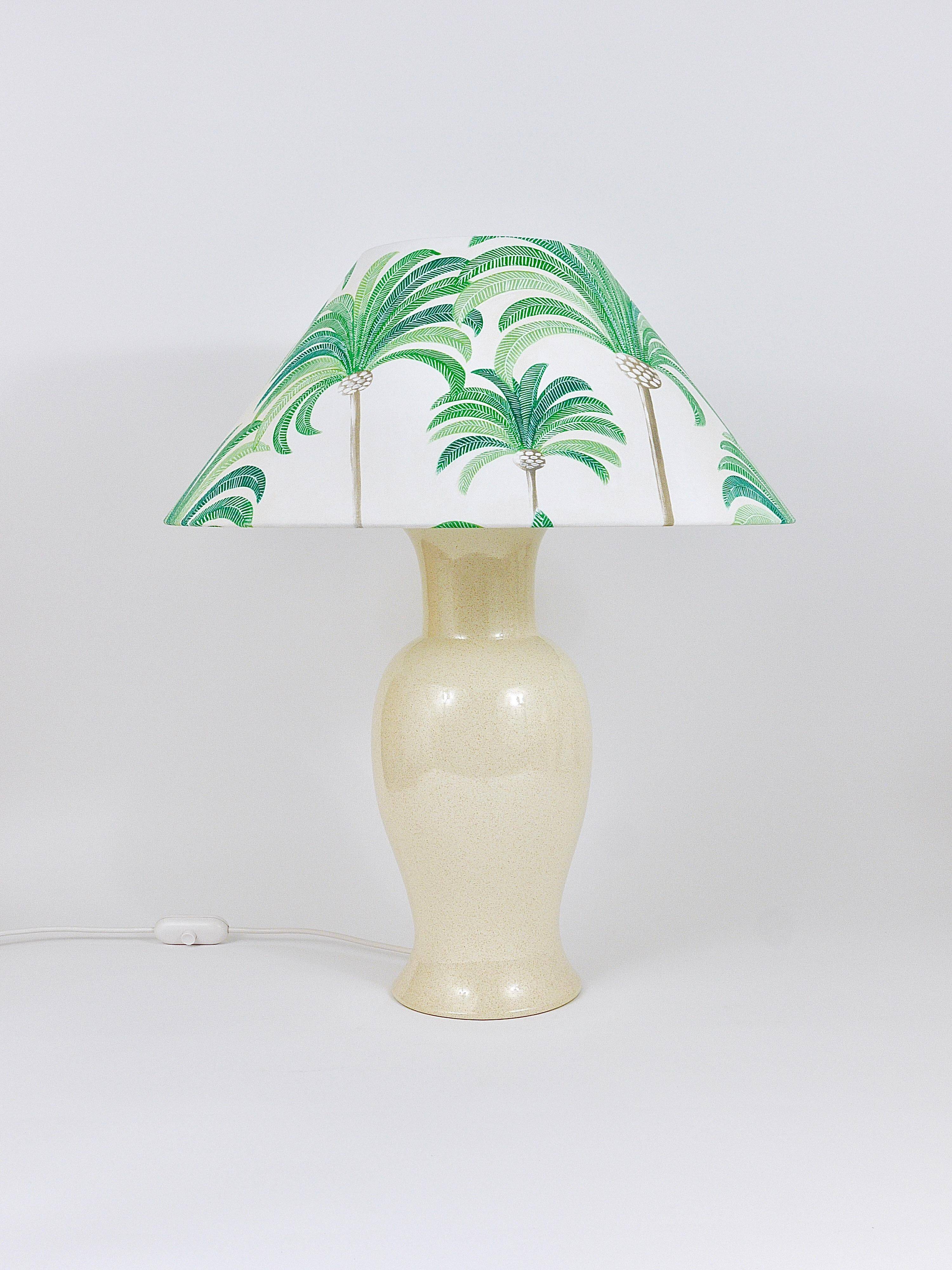 Pair of Tommaso Barbi Riviera palm tree table lamps from the 1970s with matching cushions.