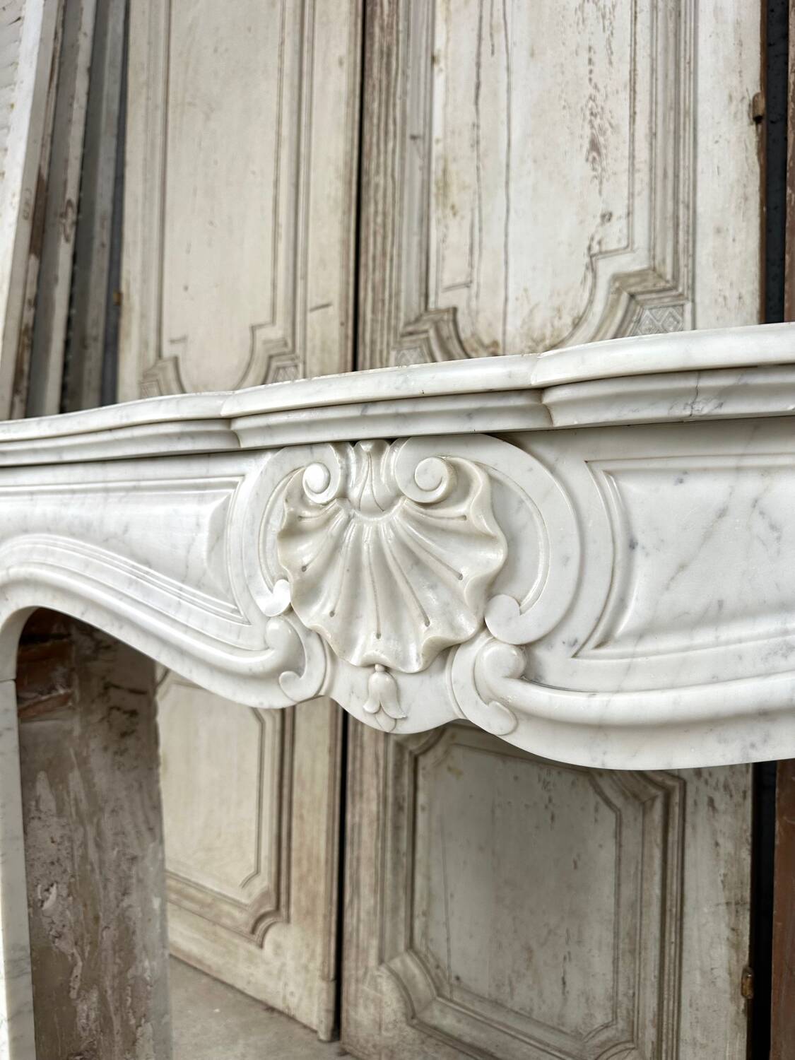 Louis XV style fireplace in white marble