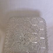 Square globe ceiling light in moulded glass.