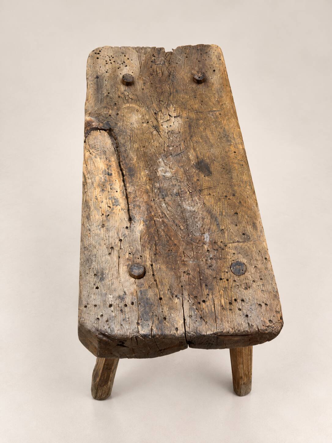 Old small bench / rustic stool made of solid wood – folk art