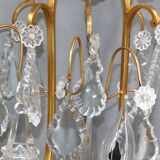 Pair of Louis XVI style gilded bronze & bohemian crystal sconces