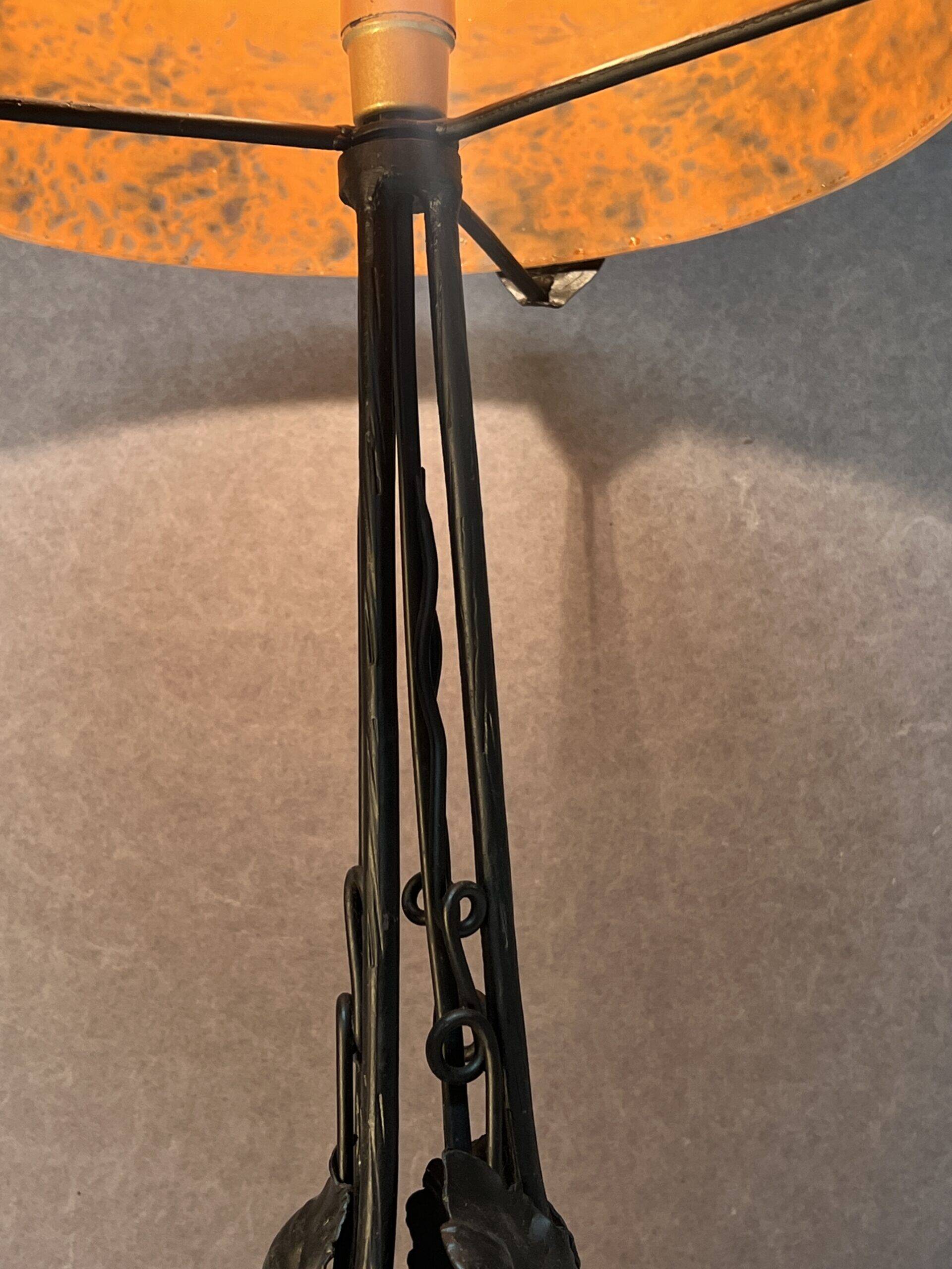 Contemporary mushroom lamp, wrought iron base and shaded orange glass shell