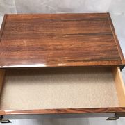 Lacquered 3-drawer chest with rosewood veneer.