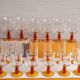 Service de 18 verres à pieds ambrés 70s