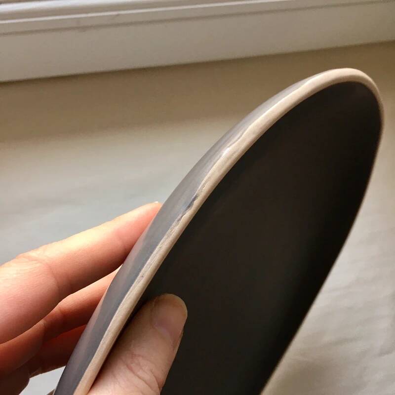 Asymmetrical grey stoneware plate 26 cm
