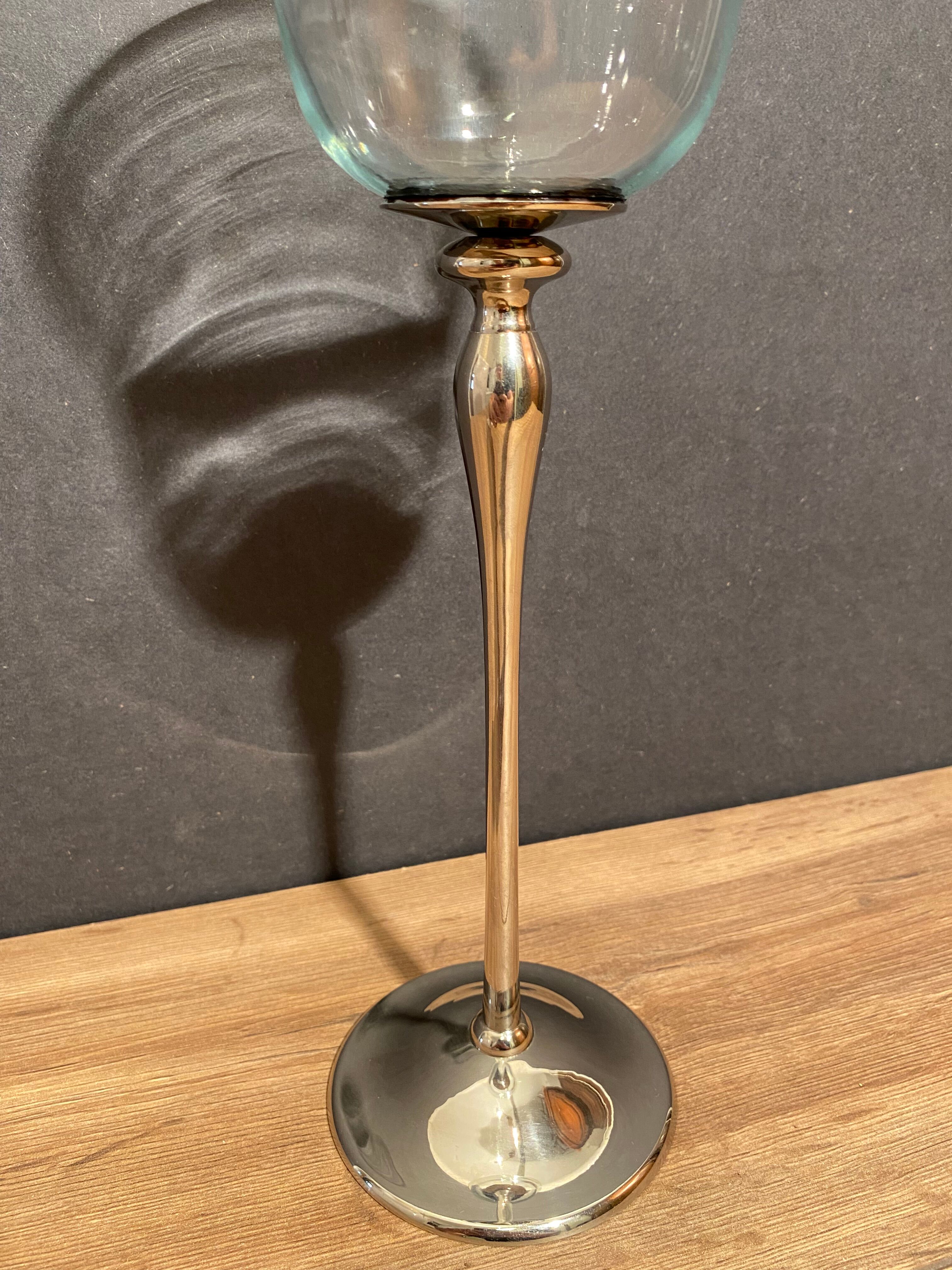 Glass photophore on high metal stand with silver patina