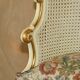 Louis XV window bench embroidered in gold and silver leaf.