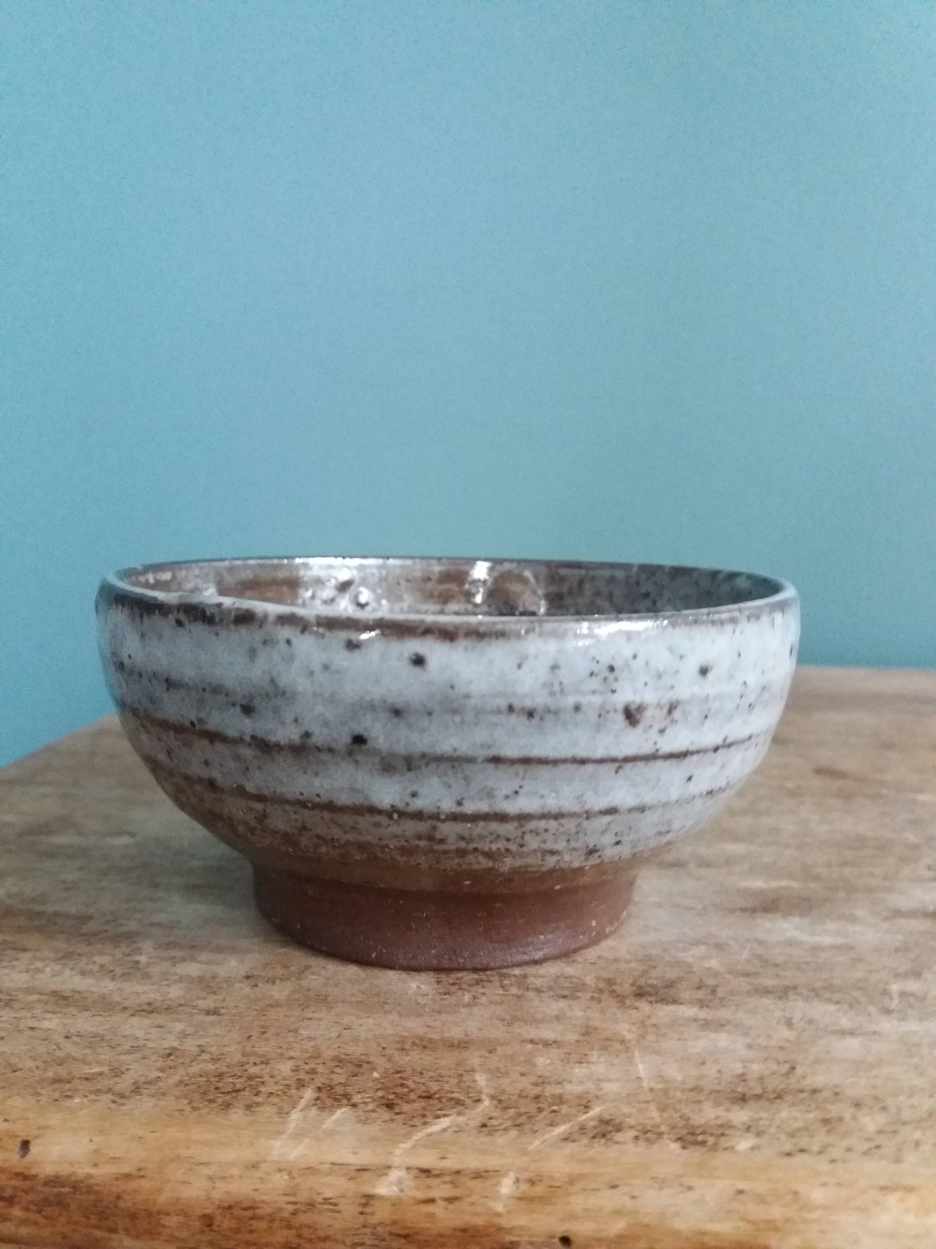Handmade stoneware bowl and emptying tray