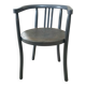 Curved wooden armchair from the late 19th/early 20th century.