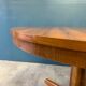 Expandable round table with butterfly extension