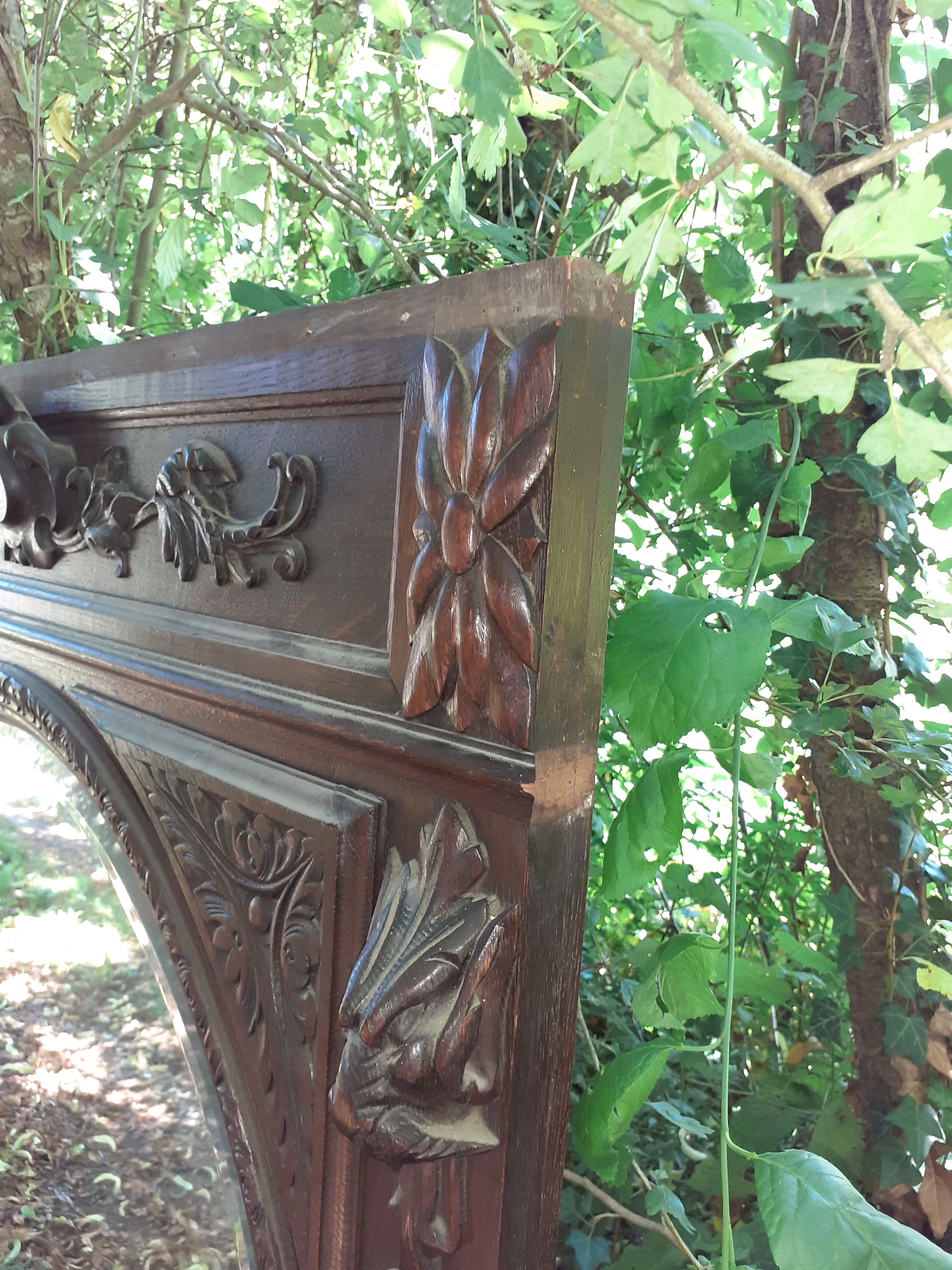 Trumeau mirror beveled in carved oak 104x144cm