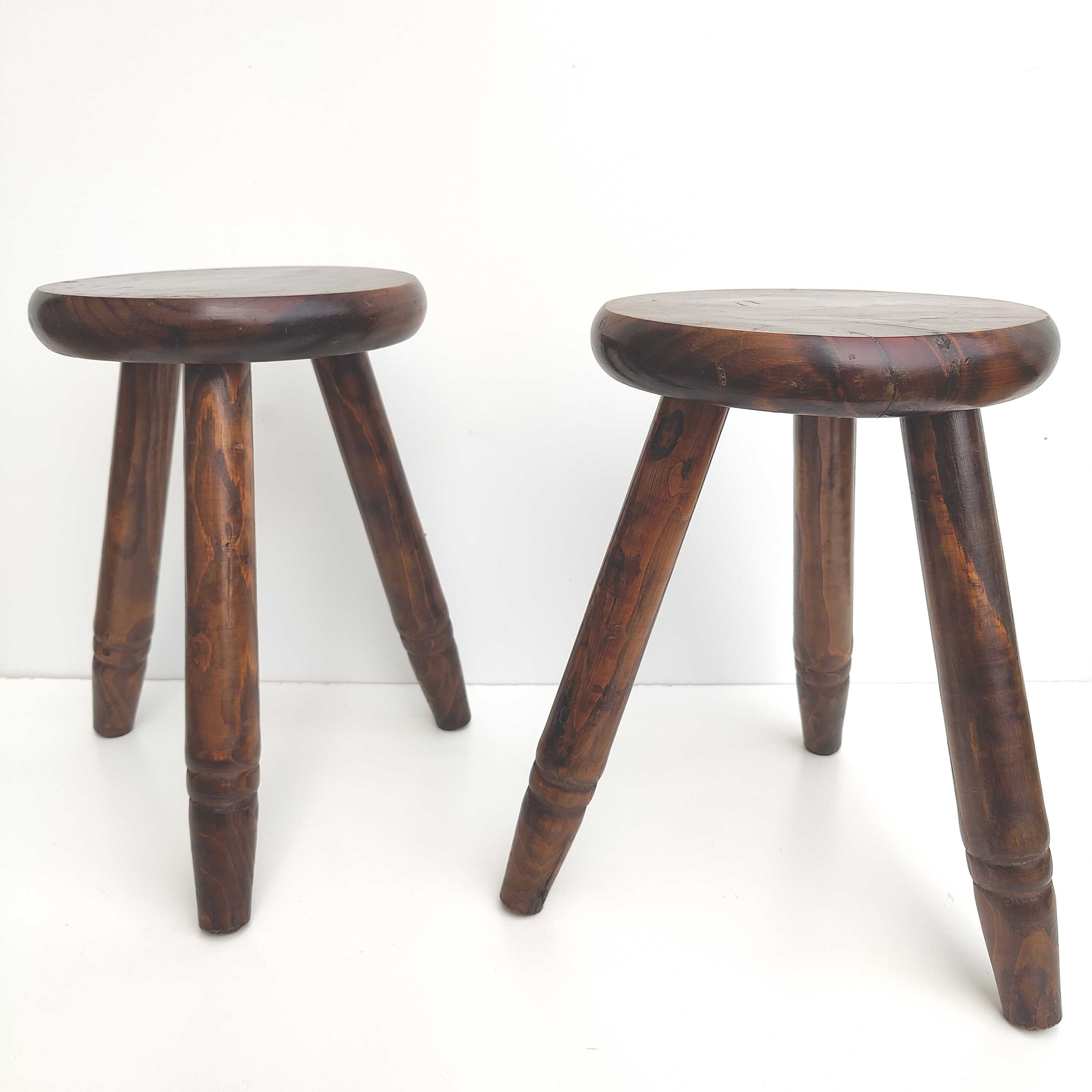 Pair of wooden tripod stools