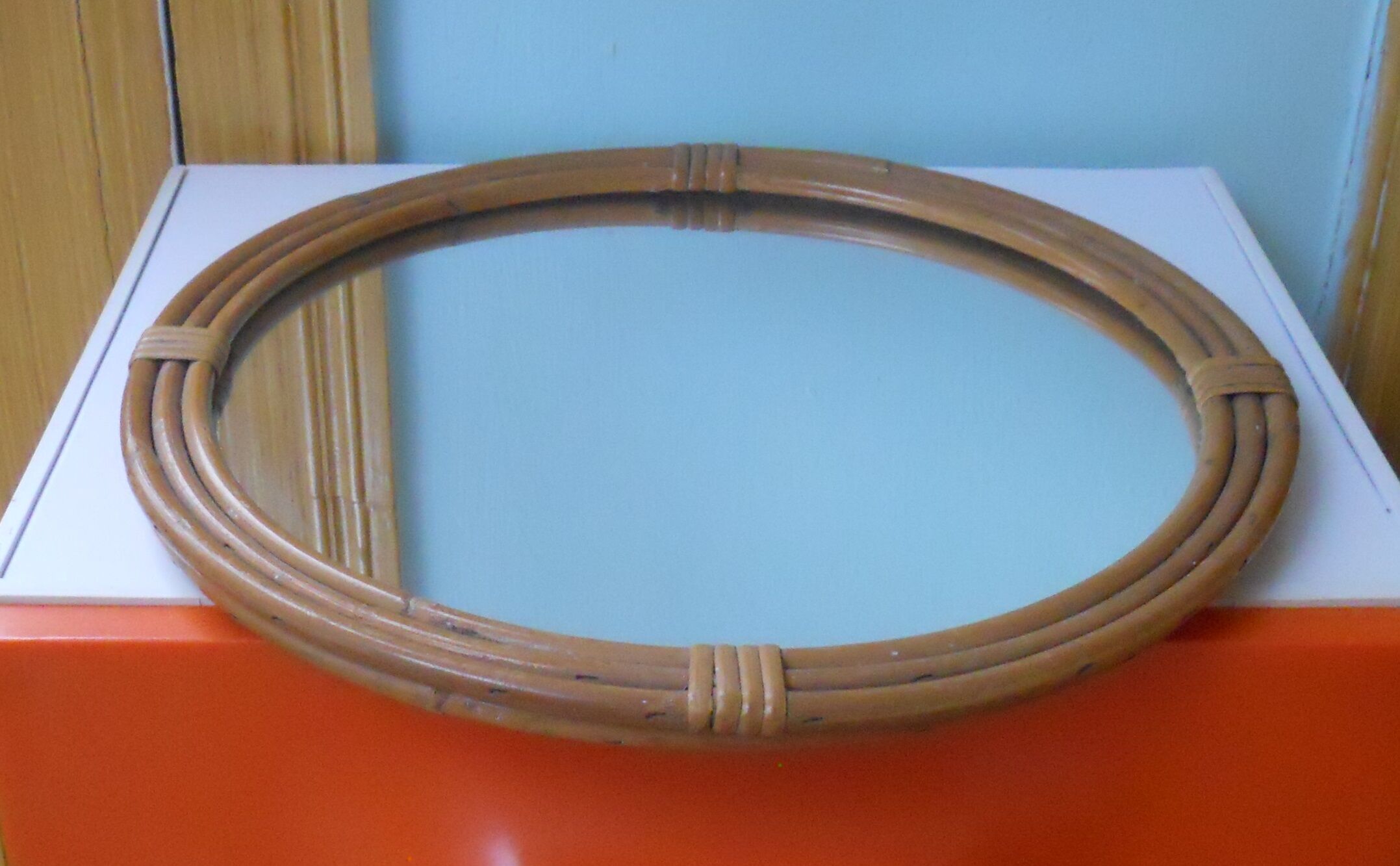Vintage rattan round mirror