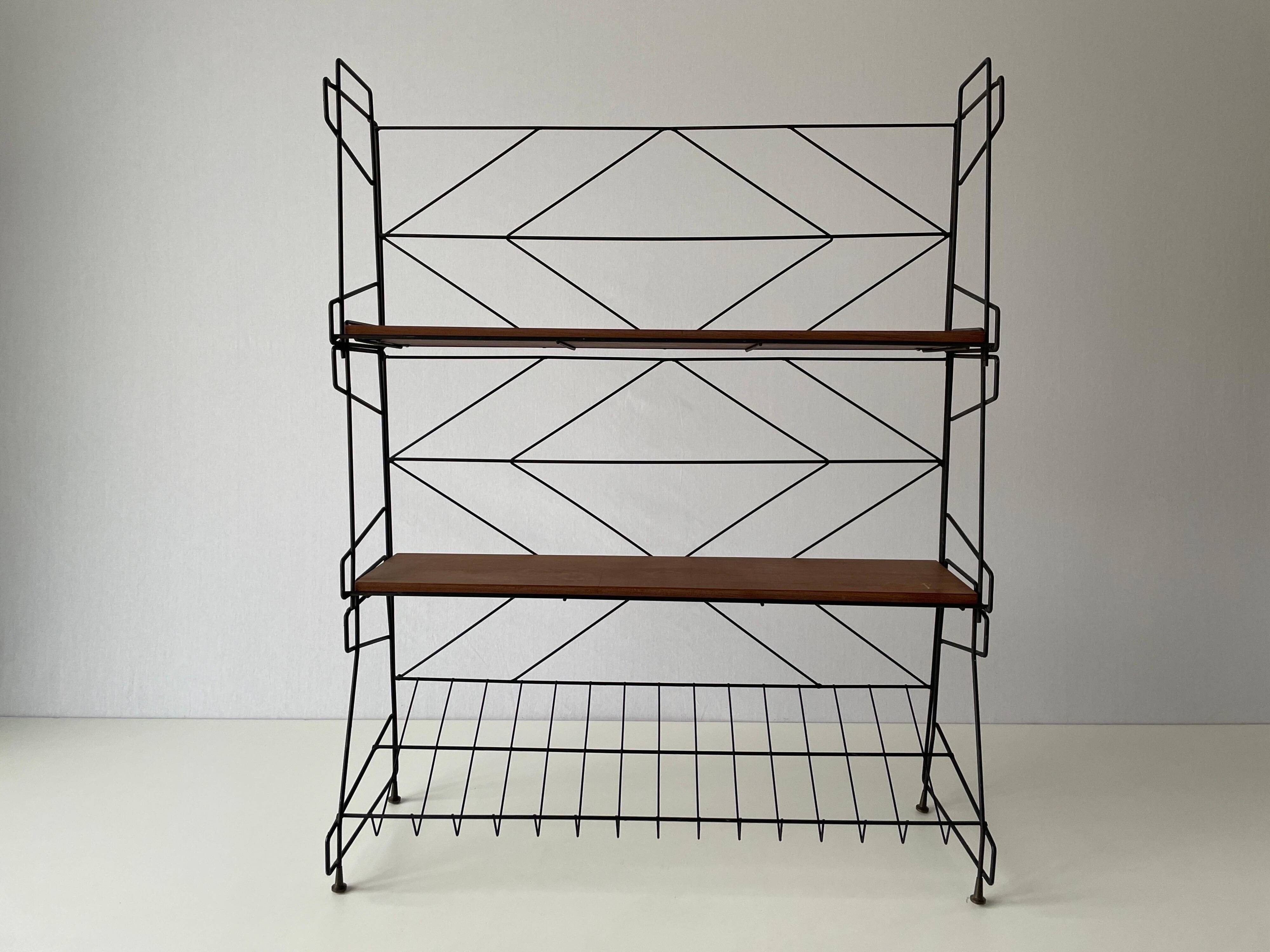 Free-standing shelf with a metal structure and 3 shelves, 1960s, Italy.
