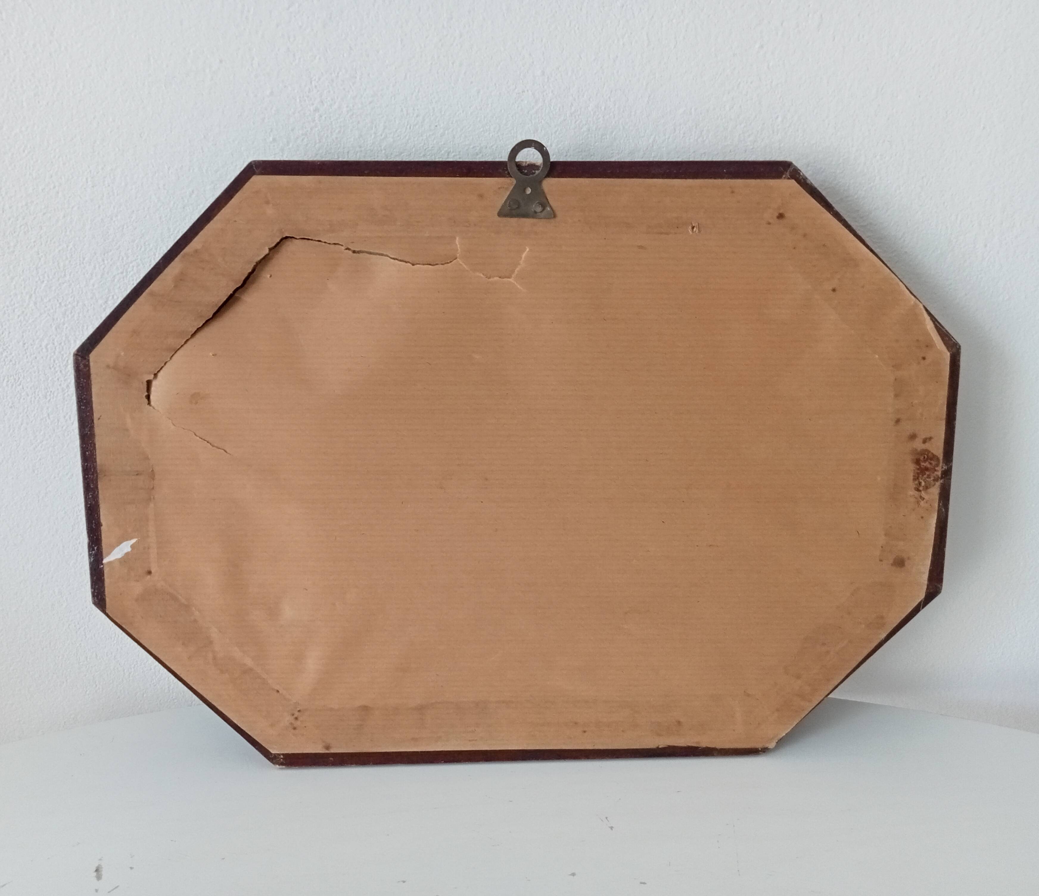 Vintage octagonal mirror from the 1960s.