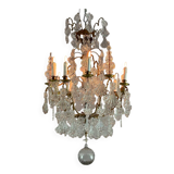 Bronze cage chandelier adorned with molded glass pendants in the shape of peacock feathers, circa 1800