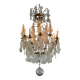 Bronze cage chandelier adorned with molded glass pendants in the shape of peacock feathers, circa 1800