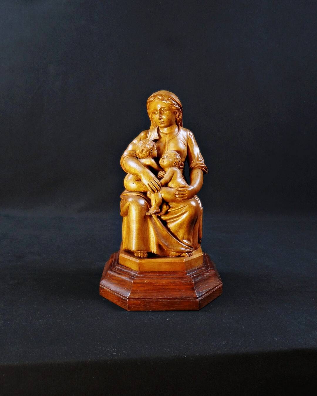 Virgin breastfeeding the Child Jesus and Saint John religious sculpture wood