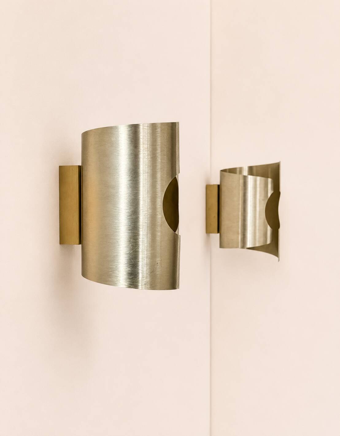 Pair of vintage wall sconces in brushed metal with a slight gold finish, France 1970.