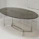 Table de Paul Legard, édition DOM, aluminium brossé et dalle elliptique de verre fumé, France, circa