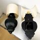 Pair of Art Deco wall lights with shades in glazed cast ceramic,Italy,1970s