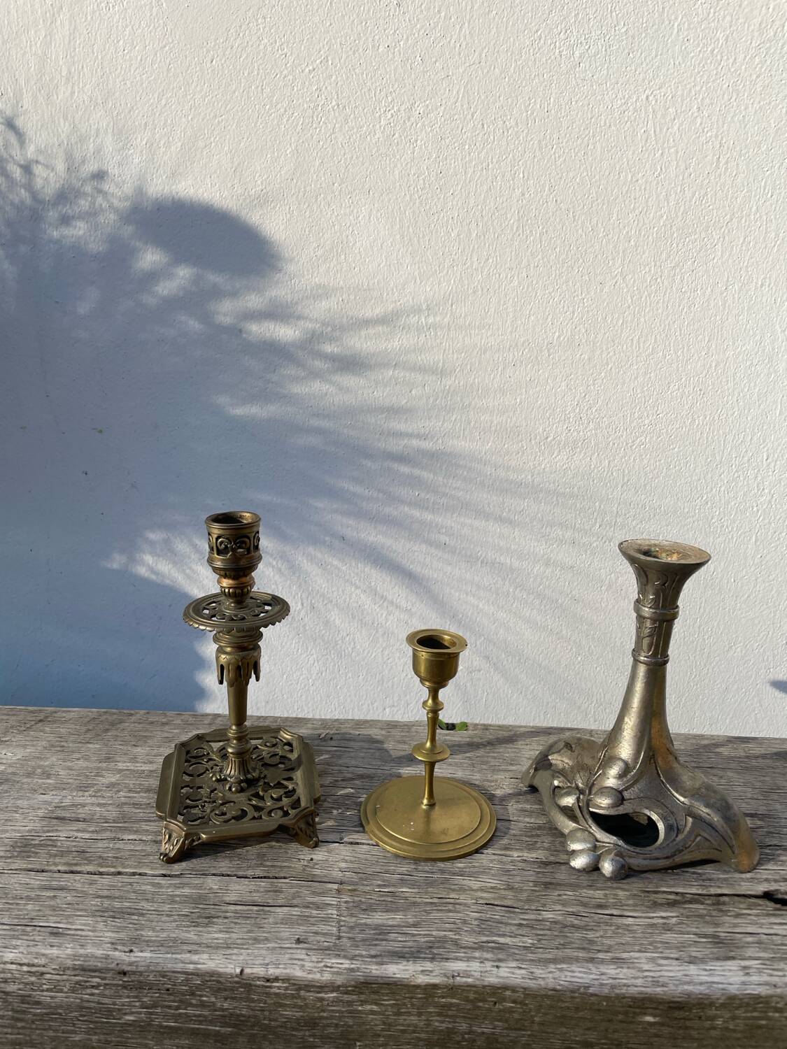 3 antique candlesticks in gold and silver metal