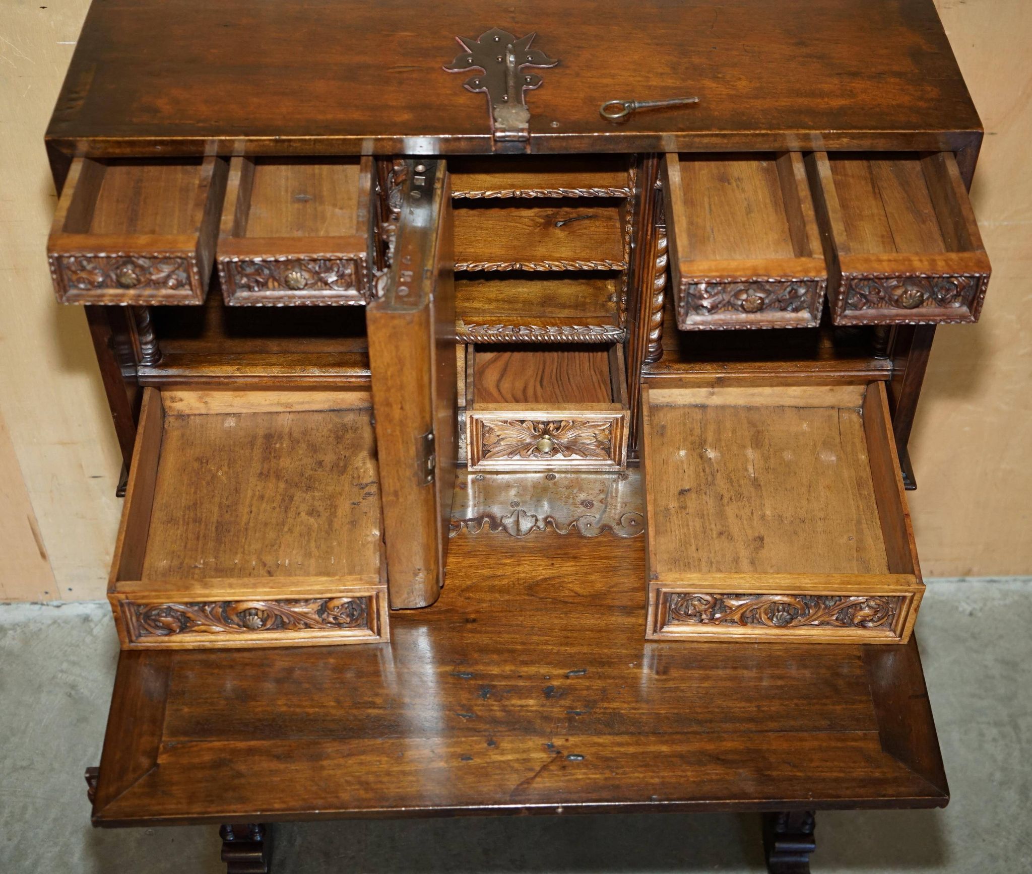 18th-century carved Spanish cabinet with hidden storage.