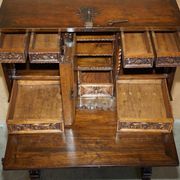 18th-century carved Spanish cabinet with hidden storage.