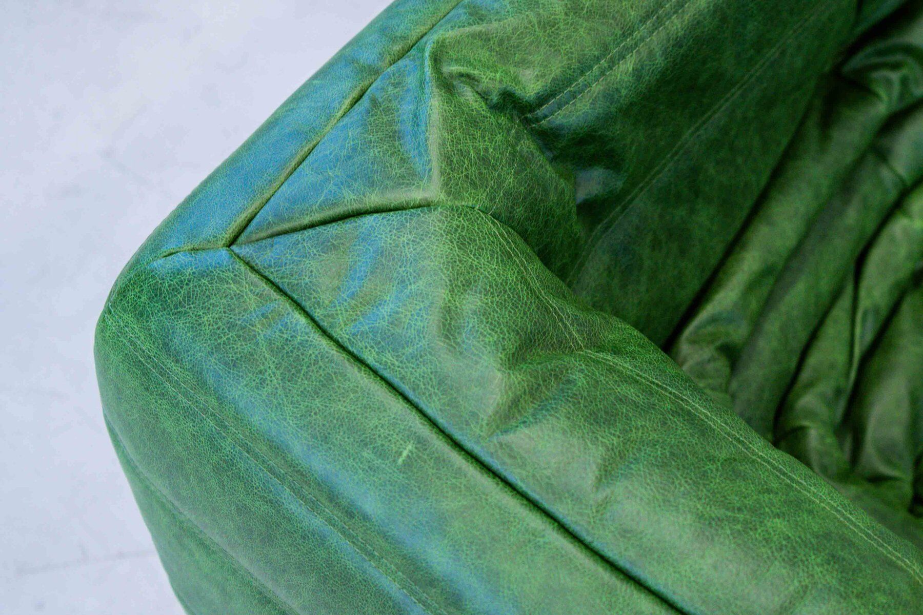 Vintage two-seat Togo sofa with arms in green leather by Michel Ducaroy for Ligne Roset, 1970s