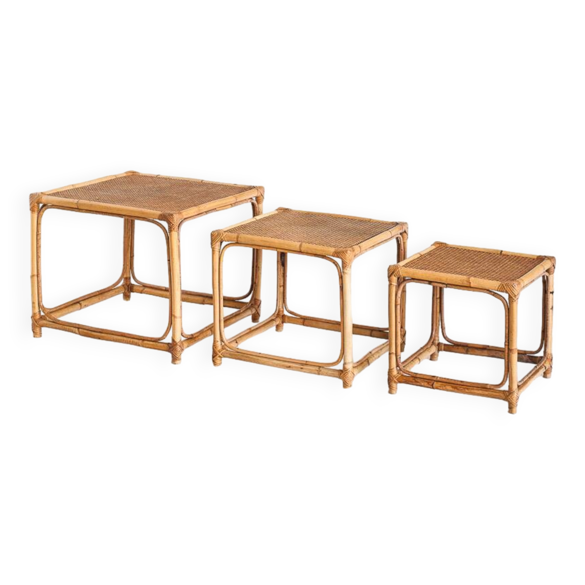 Set of three vintage nesting tables in cane. France, 1960s
