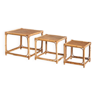 Set of three vintage nesting tables in cane. France, 1960s