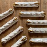 Set of 9 vintage art deco knife holders in pearly and gold ceramic