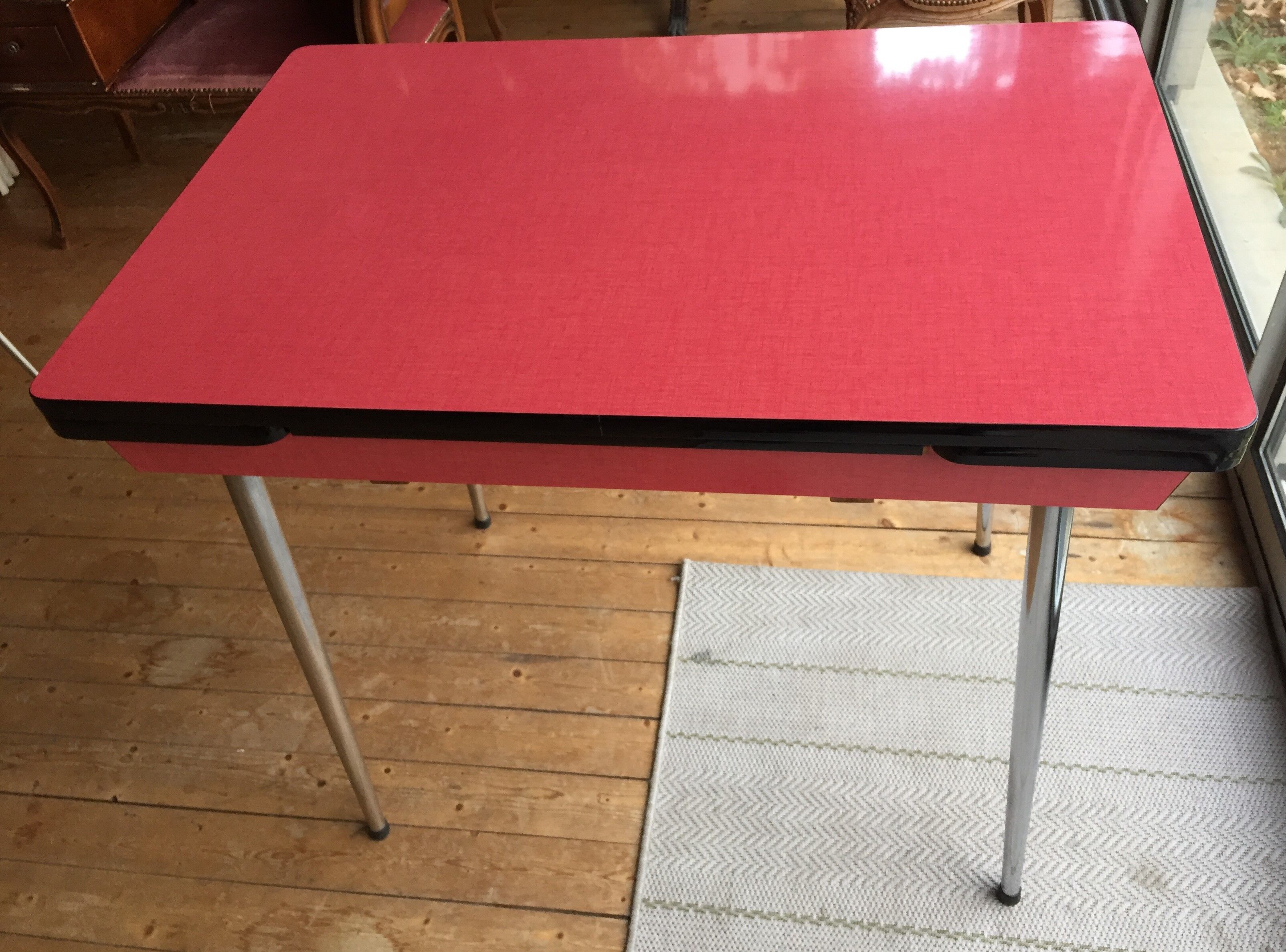 Table set and 2 vintage vintage pale red formica chairs