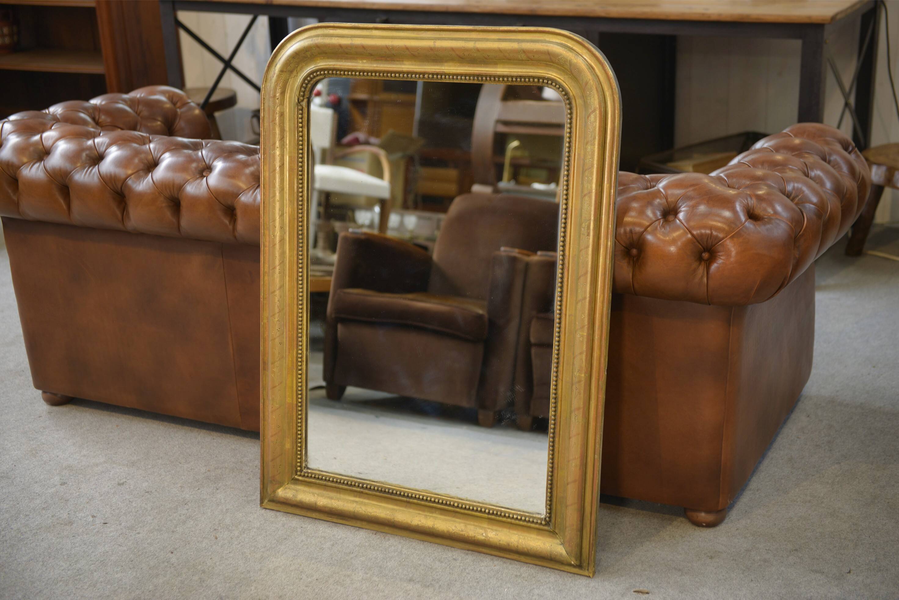 Mercury mirror from the Louis Philippe period, gilded with gold leaf, 19th century.