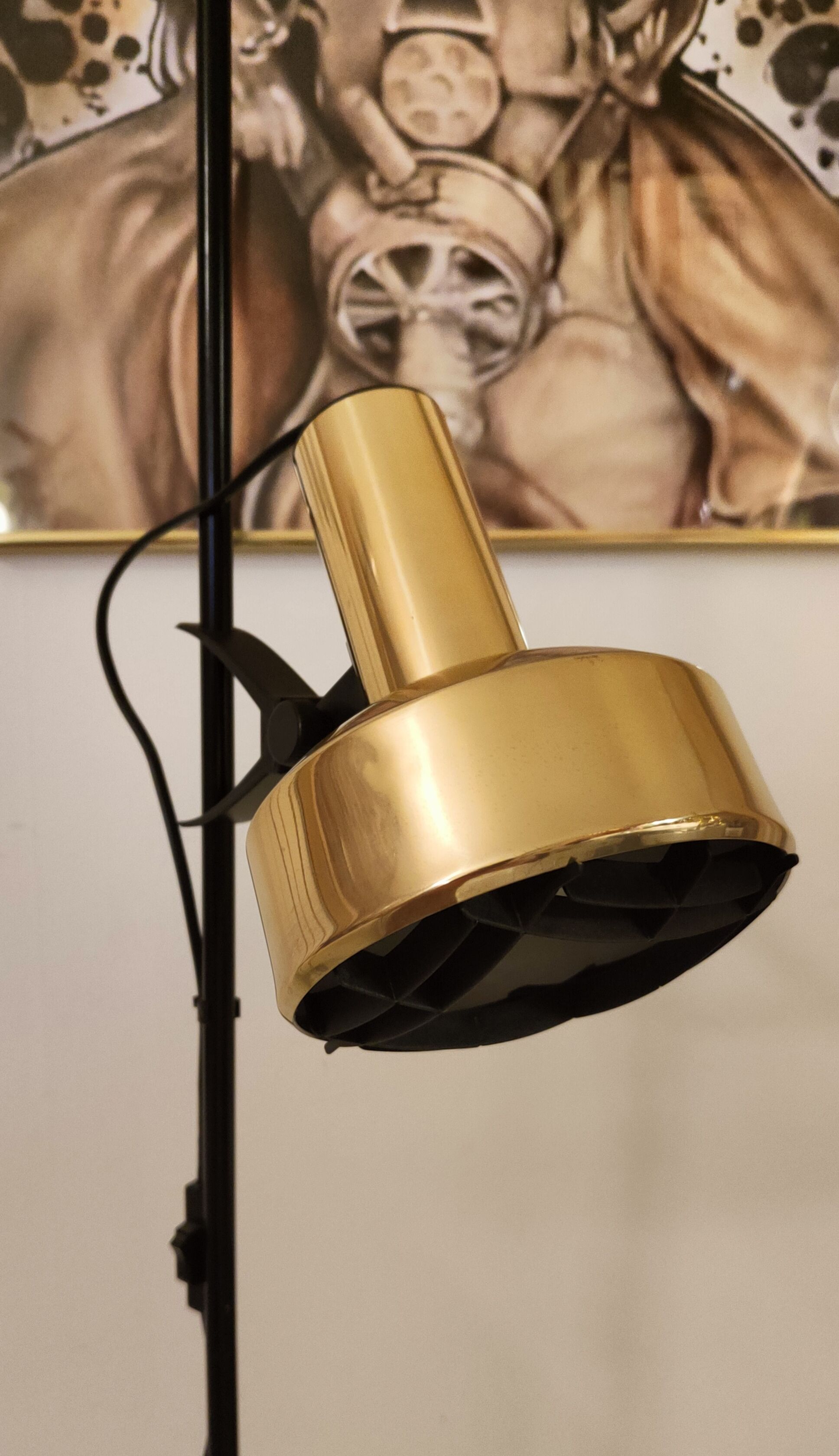 Black floor lamp is gold vintage 1980