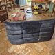 Togo sofa by Ligne Roset and its pouf from the 1970s.
